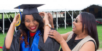 Photo of student graduate and parent