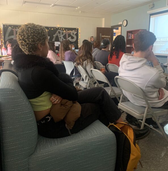 A picture showing students watching a documentary