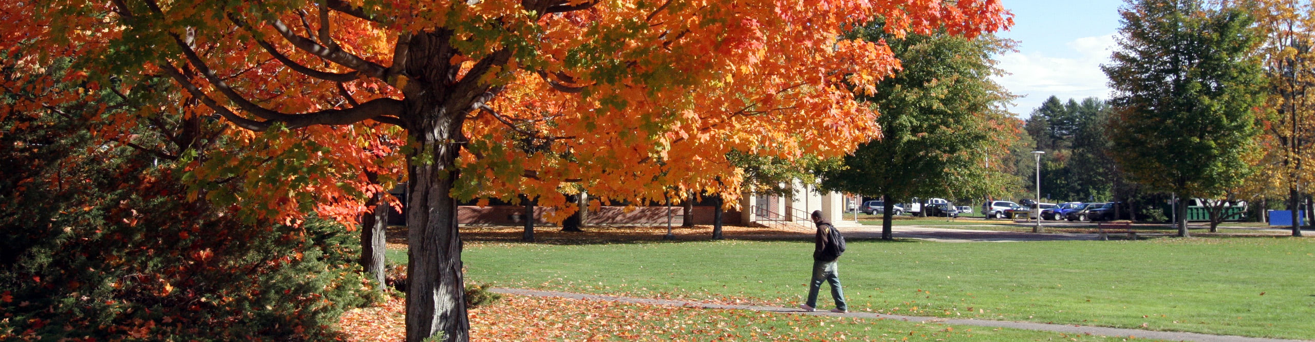 Student outside with a backpack.