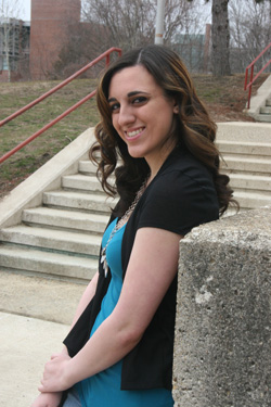 Girl standing in front of stairs