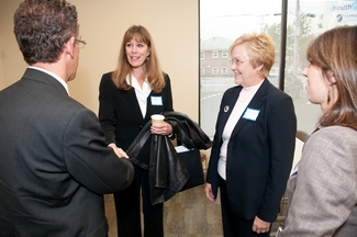 President Lane Glenn, Katie Budinger of Tallman Eye Associates, Dean Jackie Long Goding, and Danielle Perry of Holy Family Hospital