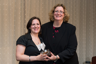 North Andover resident Lindsey Mayo, Northern Essex Community College director of alumni relations, accepted an award from Christine Tempesta, chair of the Council for Advancement and Support of Education (CASE) District 1 Board of Directors. 