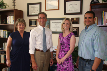 Linda Fagan, President Lane Glenn, Perry Lara, and Daniel Rivera.