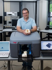 Professor Jim Cahaly shows off the college’s new 3D printer