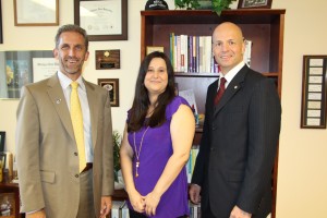 NECC President Lane Glenn with employee recognition winners for the third quarter Despina Lambropoulos and Jeff Williams.