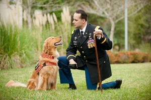 Former U.S. Army Captain Luis Carlos Montalván and his service dog Tuesday