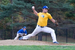 Ryan Decker of Salem, NH, an NECC sophomore majoring in liberal arts threw a pitch during the NECC Alumni Day Game.