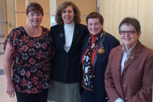 Retiree Charlene Boucher, retiree Linda Hummel-Shea, Jean Poth, vice president of institutional advancement who represented NECC President Lane Glenn at the event, and retiree Pat Demers.