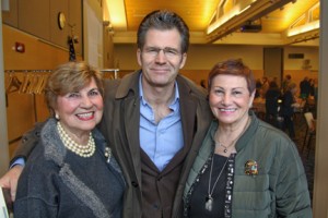 Women of NECC President Gerri Murphy, author Andre Dubus, and Jean Poth, vice president of NECC's Institutional Advancement.  