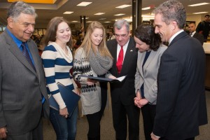 Haverhill Mayor James Fiorentini, Early College Graduates Kayleigh Bergh and Jocelyn Dubois, Haverhill Superintendent James Scully, State Senator Kathleen O’Connor Ives, and NECC President Lane Glenn. 