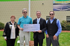 Shown left to right in photo:  Jean Poth, NECC vice president of institutional advancement; Peter Schwarz, owner Leewood Realty; Lane Glenn, NECC president, and Paul Chanley, chair, NECC Engineering Dept;