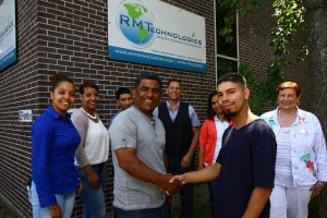 Shown front row left to right:  Rafael Guzman, RM Technologies, and Dimitrius Gonzalez, NECC Engineering student. Shown back row left to right:  Esthefanie Castillo, RM Technologies; Yakaira Inoa, RM Technologies; Jessie Cabral, RM Technologies; Paul Chanley, chair, NECC Engineering Department; Alexandra Santos, RM Technologies; and Jean Poth, NECC Vice President of Institutional Advancement.    