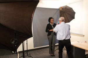 Jessica Castillo (NECC student) gets her LinkedIn portrait taken by Professor Lance Hidy.