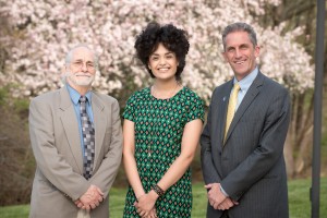 NECC English Professor Paul Saint-Amand, founder of the Peace Poetry Contest Reading, with former student diannely Antigua, who was the guest speaker at the Friday night event, and NECC President Lane Glenn.