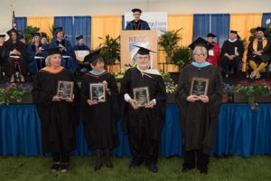 Catherine Dabrowski, Linda Desjardins, Alan Hislop, Susan Sanders, and Nancy Nickerson (not in photo) received emeritus awards during NECC's graduation ceremony. 