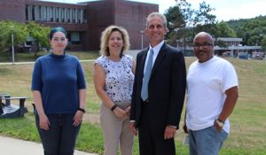 The recipients of the third quarter Employee Recognition Award were recently photographed with NECC President Lane Glenn include Adrianna Holden-Gouveia, Sharon McDermot, and Ramon Suero.