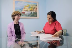 Clinical research coordinators review information with clients in private consent rooms. 