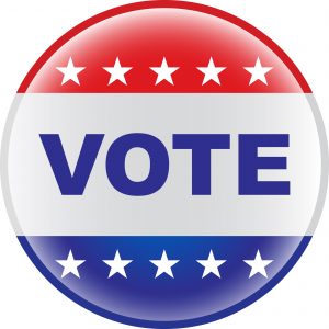 Red, white and blue button that says vote.