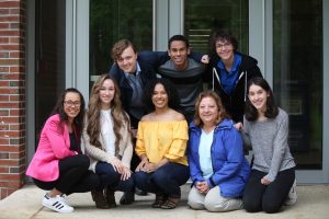 all eight of our new student advocates smile towards the camera