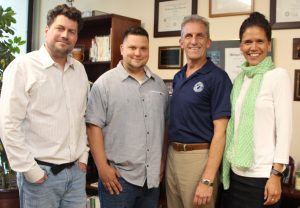 Shown left to right are NECC Employee Recognition Award winners Kyle White, Shawn Donnelly, NECC President Lane Glenn, and Lizzie Casanave.