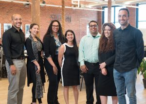 The three Station1 fellows pose with their faculty.