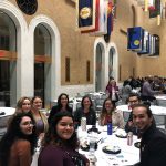 NECC students sitting at a table with State Rep Minicucci