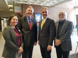 Guest speaker Westy Egmont , Janel D'Agata-Lynch, Presedient Lane Glenn, and Paul Saint-Amand stand in the Spurk foyer. ,