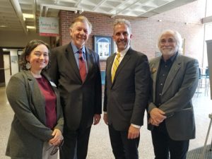 Guest speaker Westy Egmont , Janel D'Agata-Lynch, Presedient Lane Glenn, and Paul Saint-Amand stand in the Spurk foyer. ,