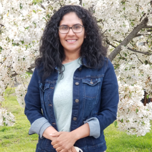 photo of Sussan Benoit under a blossoming tree