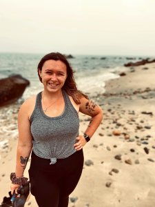 portrait of Victoria Cerasuolo on the beach.