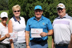 Golf team of four, two women and two men