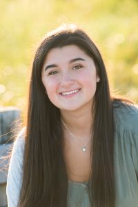 portrait of young woman with long dark hair