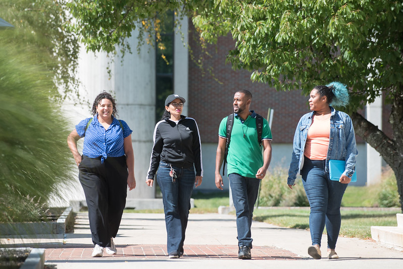 four students walking on the Haverhill campus