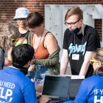 Students checking in at table