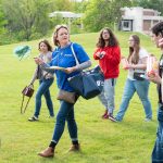 NECC Employee leads crowd on a tour