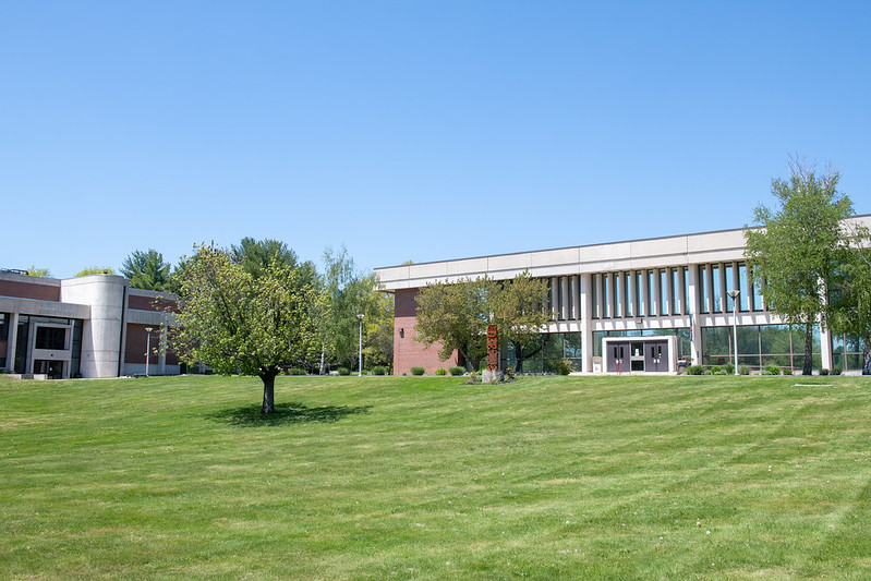 The haverhill library sits atop a gentle hill of manicured green grass