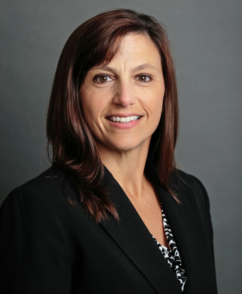 headshot of diane martin, she looks into the camera with a smile