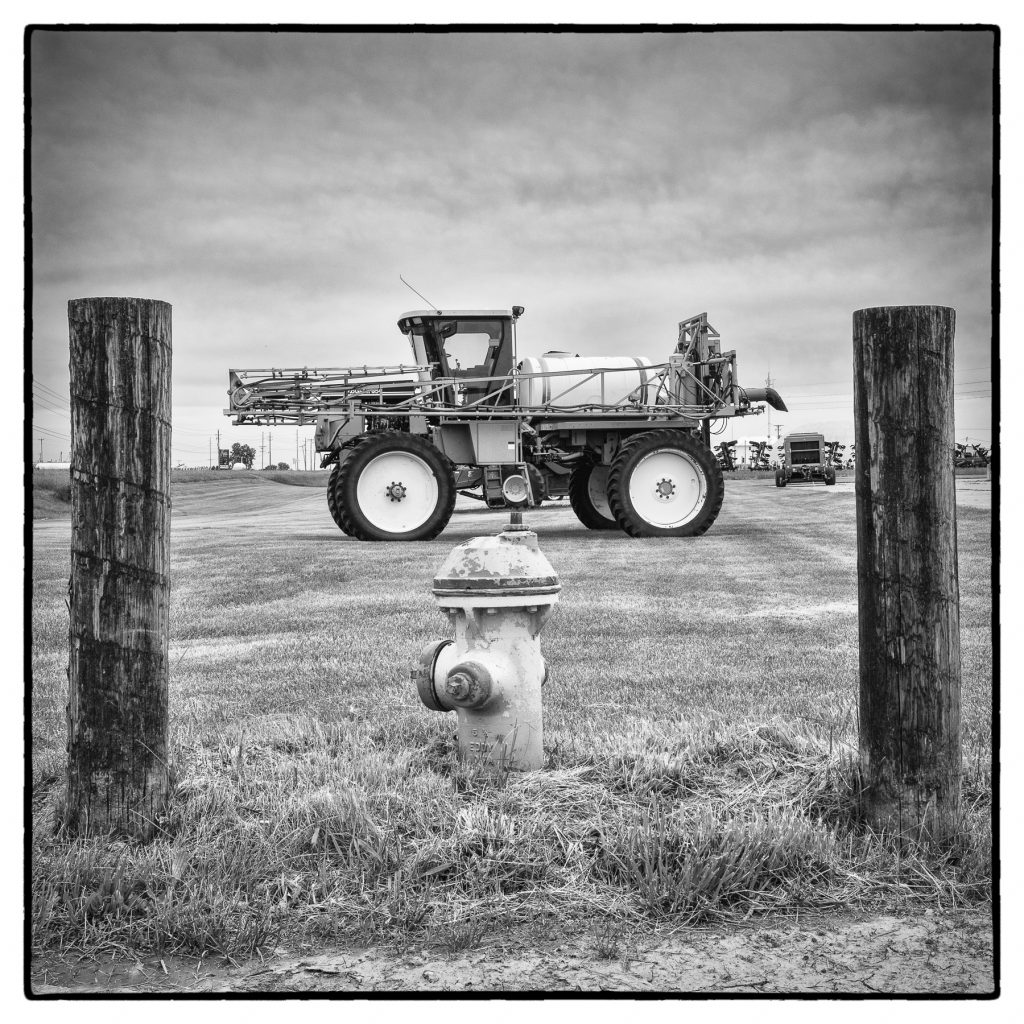 black and white Image of john deer tractor 