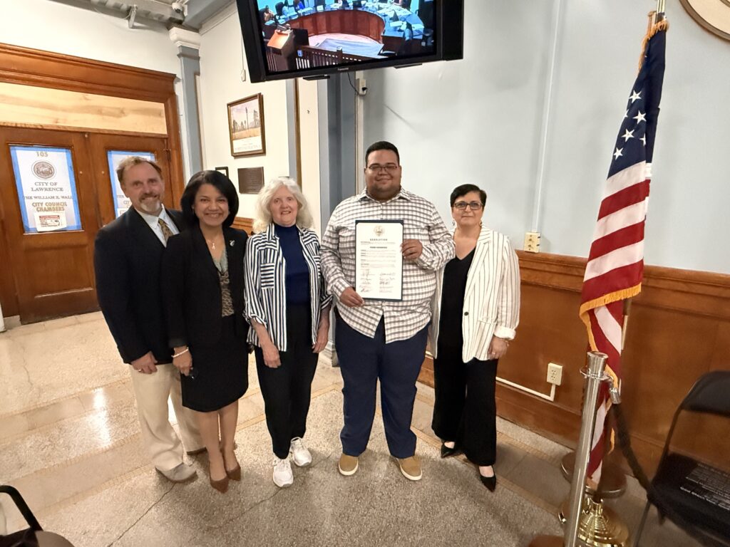 pedro poses with citation at city hall