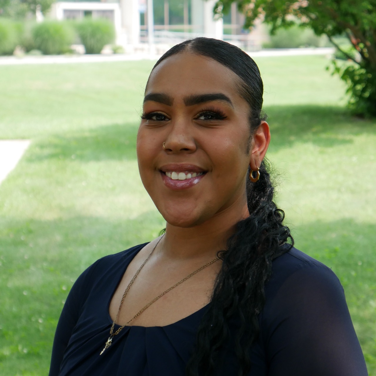 headshot of Eudania-Chucha Aquino