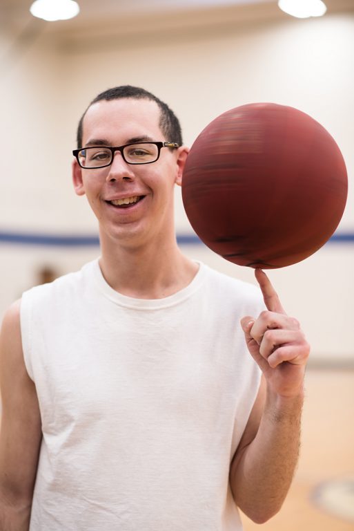 Robert Howard, spinning a basketball on one finger.