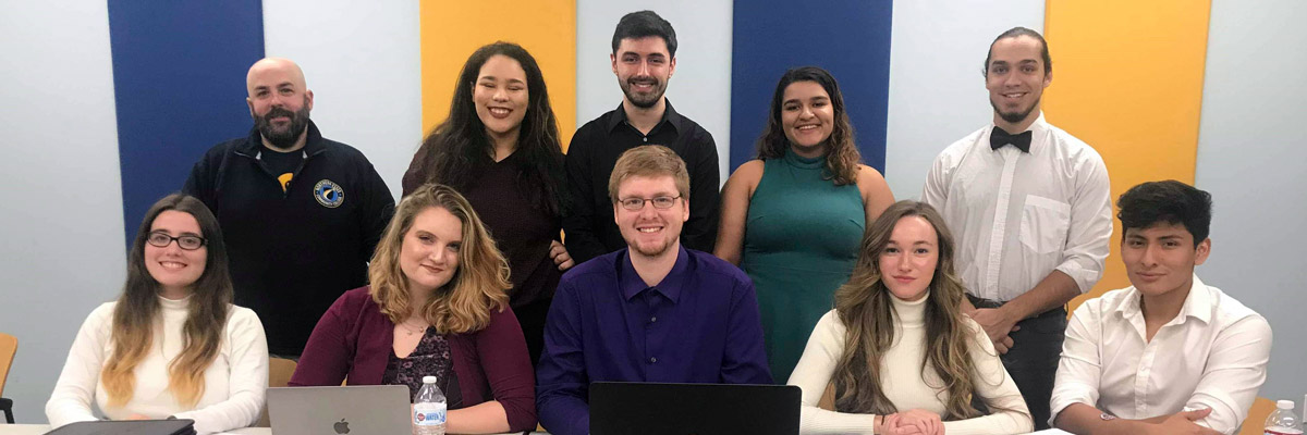 Ten 2018 Student Government members in our Haverhill meeting room, smiling and ready to make change.